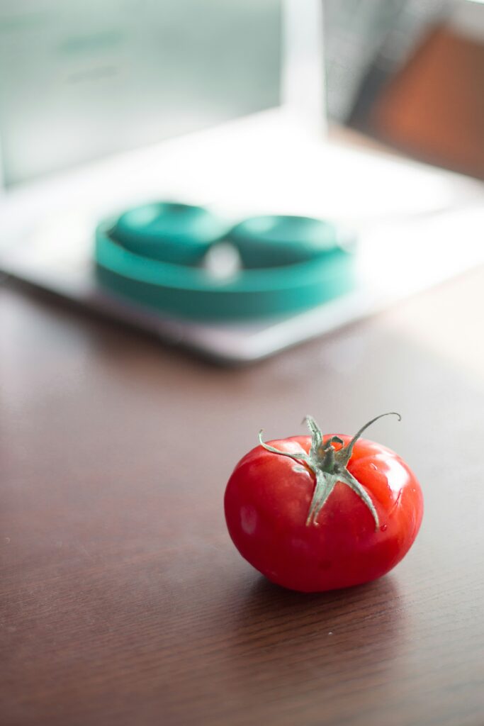 Pomodoro tomato on desk study environment